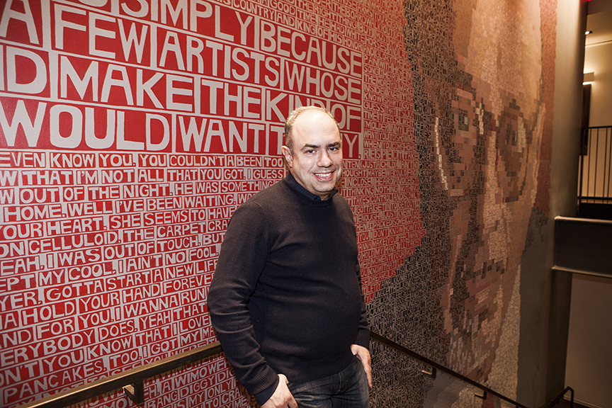 Pete Ganbarg in front of Ahmet Ertegun Mural