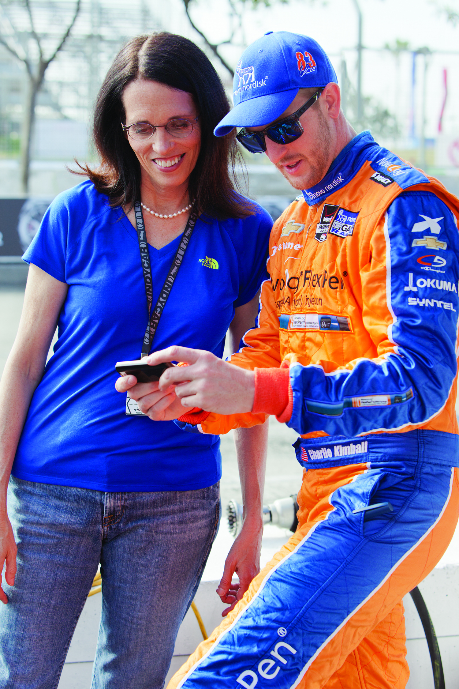 Anne Peters ’79, MD, works with Charlie Kimball at the Long Beach Grand Prix in April 2014, reviewing Kimball’s blood sugar readings on his continuous glucose monitor. The monitor is mounted on the dash of his IndyCar and the readings are transmitted back to the pit to confirm that his blood sugar is in the safe range for him to drive. Diagnosed with Type I diabetes in 2007, Kimball is now the driver for Novo Nordisk Chip Ganassi Racing in the Verizon IndyCar Series. 