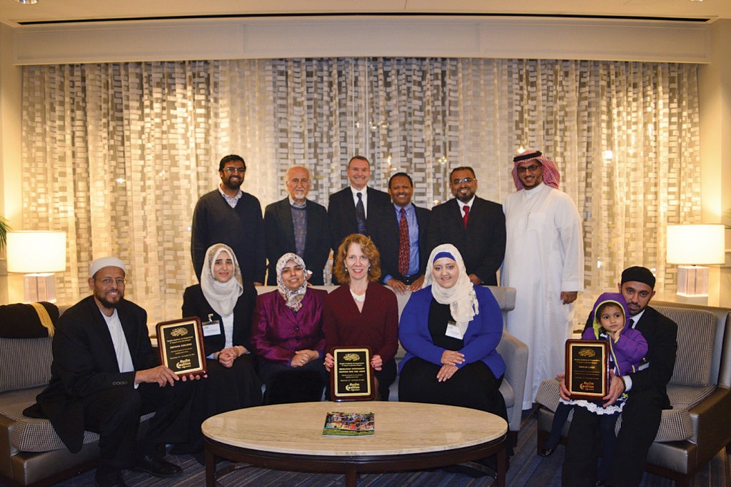 The Muslim Coalition of Connecticut selected Wesleyan’s Center for the Arts (CFA) as one of three honorees. Director of the CFA Pamela Tatge ’84, MALS ’10, P’16 (center) accepted on behalf of the university. Imam Zaid Shakir (left) from Zaytuna College and Imam Khalid Latif (right) from New York University were also selected as those “bridging cultural gaps.” Photo: Muslim Coalition of Connecticut.