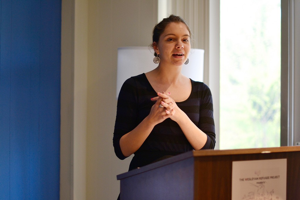 Event organizer Sophie Zinser ’16, a College of Letters and French studies major and student fellow for the Center for the Humanities, made connections with the Amal Foundation in December 2015. The organization supports refugees and their host communities by offering them access to education. “I had no idea that months later [Amal and the Wesleyan Refugee Project] would be planning a show together, bringing art from Za’atari here to Wesleyan. We have made it our mission to represent these artists as if they could actually be at Wesleyan,” Zinser said. Photo: Olivia Drake MALS ’08